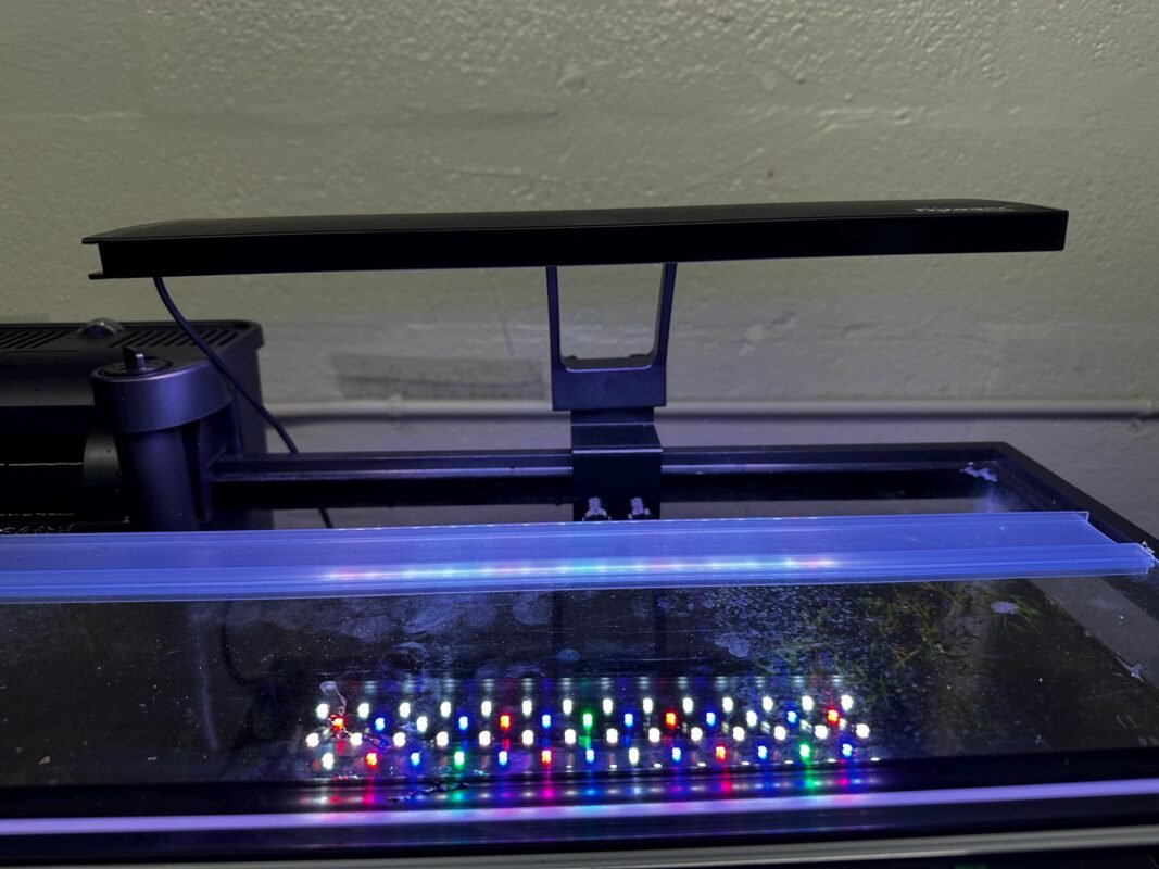 Rimmed Adapter for Fish Tank Lighting 2 a light on a device