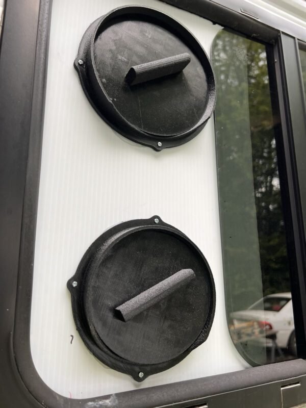 Venting an Ecoflow Wave 2 out of a Travel Trailer 2 a black circular object on a white surface