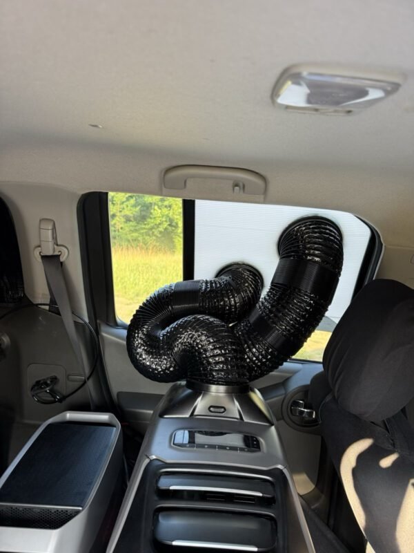 EcoFlow Wave Mounted in an Xterra SUV DIY Window Kit 5 a car with a vent